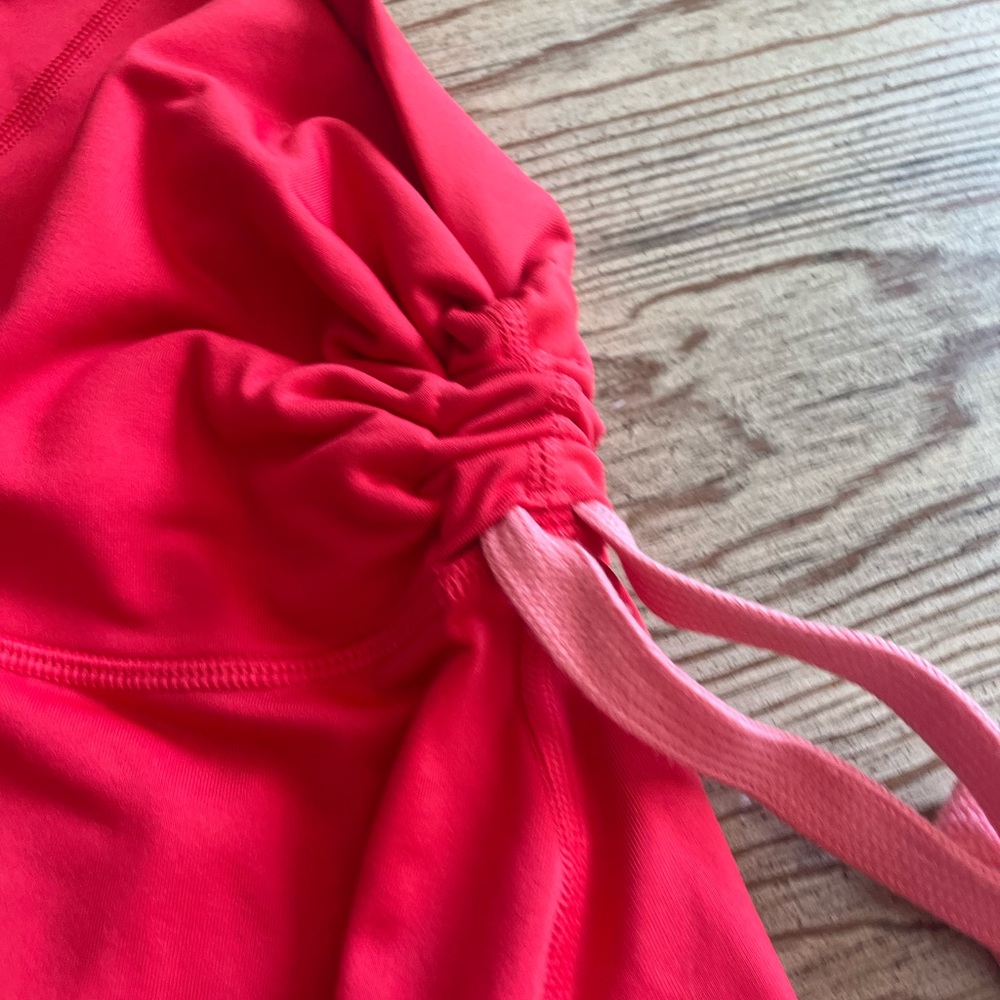 Size small Nike thermal running shirt, pink with high neck. Excellent condition